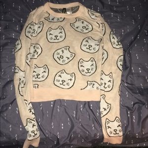 Blush pink cropped sweater with cat faces